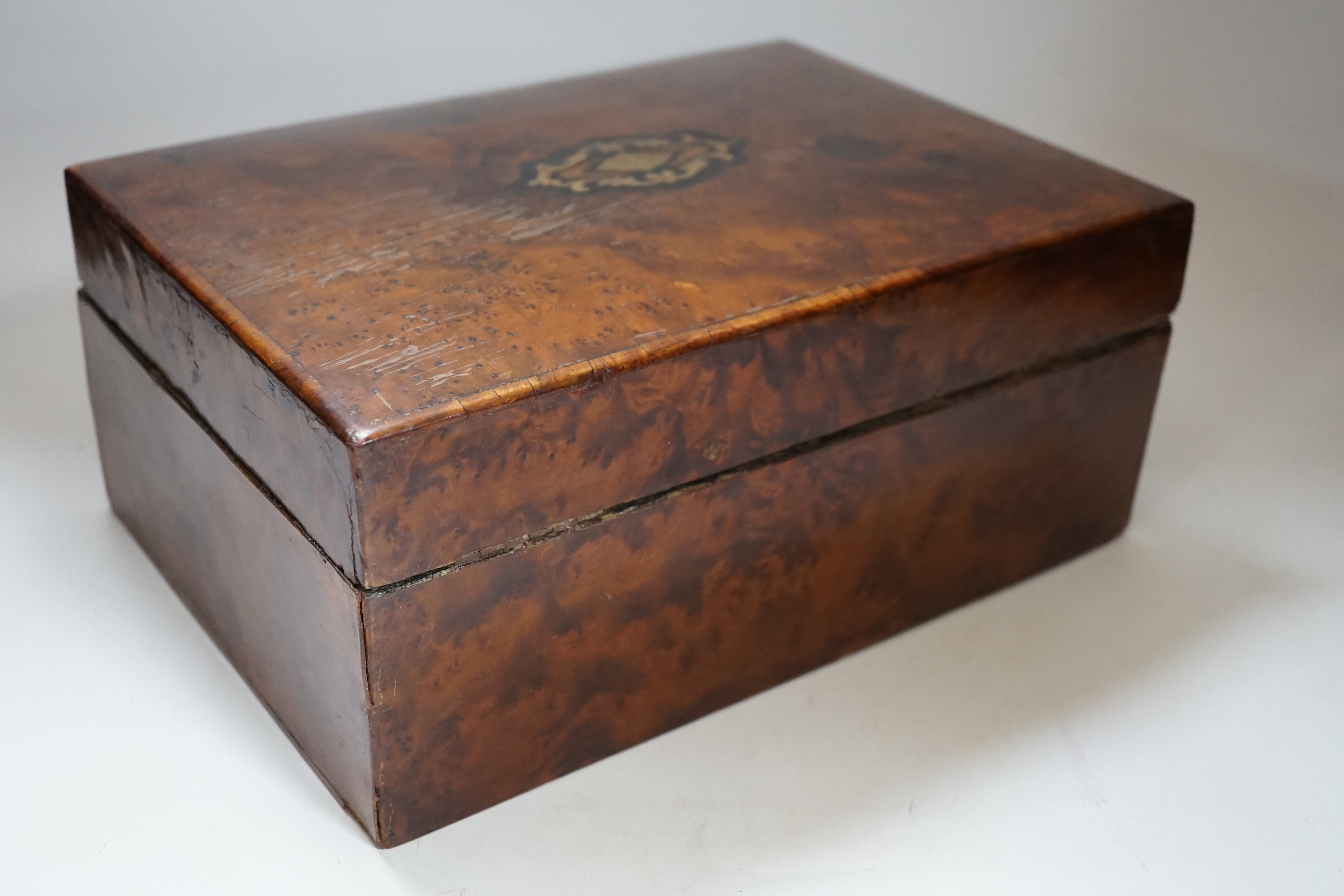 A Late 19th century burr yew and brass inlaid jewellery box, with lift out compartment and key, 28cm wide